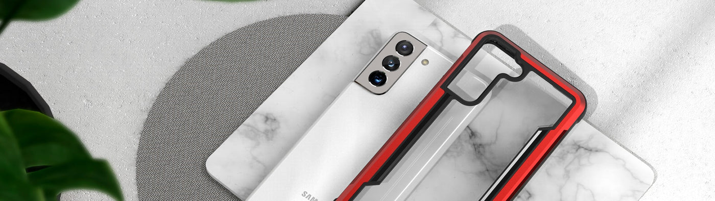 A Galaxy S21 is covered with a red case from Raptic.