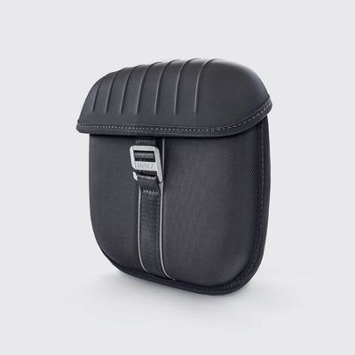 Smartform case for Apple AirPods Max against white background with lid clasped by metal loop.