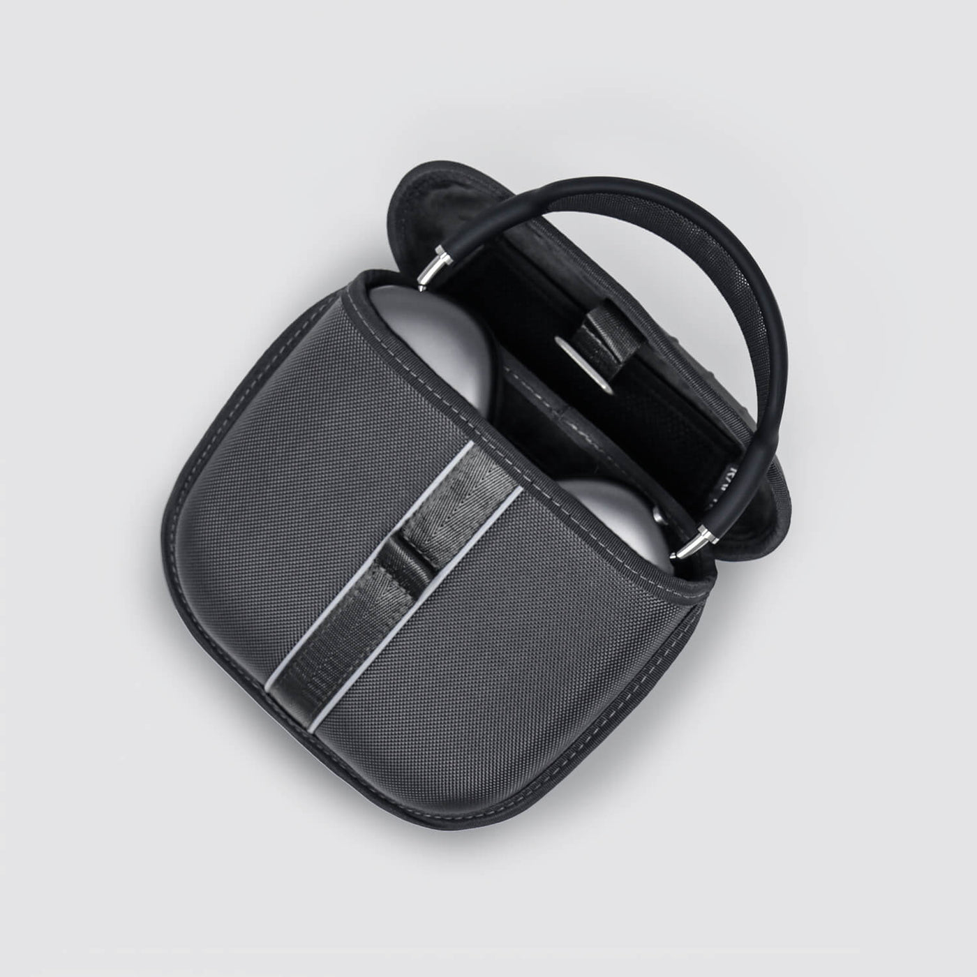 Smartform case for Apple AirPods Max, laying flat on white background, with AirPods Max headphones half inside case