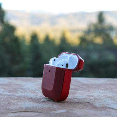 Anodized aluminum protective Case for AirPods with carabiner. Raptic trek in red.#color_red
