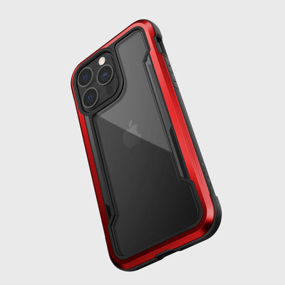 iPhone 13 Pro in Raptic Shield case - color red - with drop protection #color_red